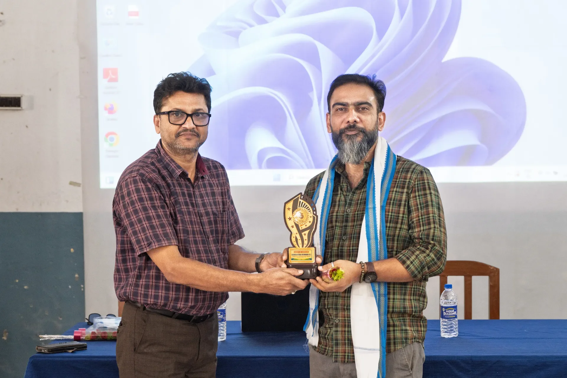 Mr. Riddhi Bhattacharjee was honored by the Principal of Jatindas Boys School.